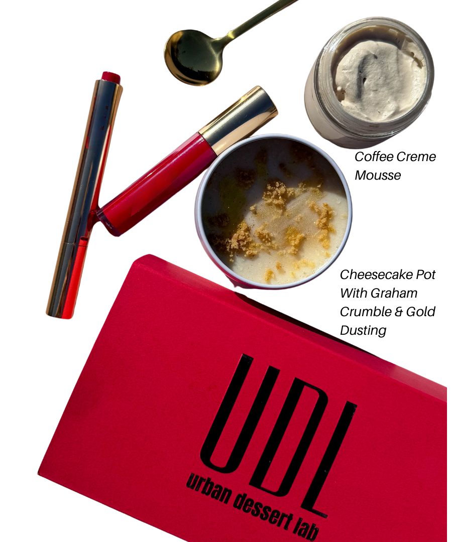 Red container with 'Urban Dessert Lab' branding, dessert items, and a spoon on a white background.