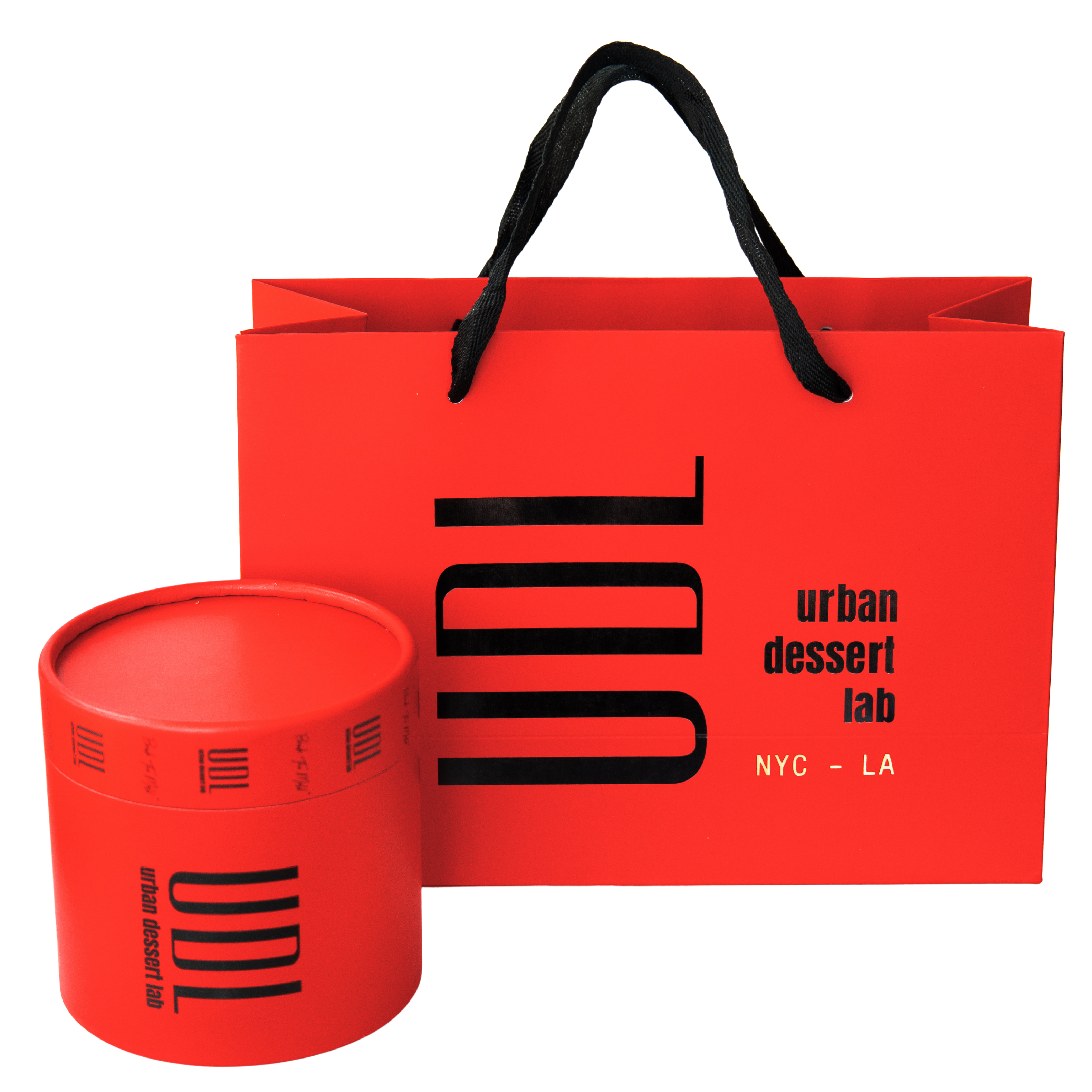 Red container and bag with 'urban dessert lab' branding on a white background