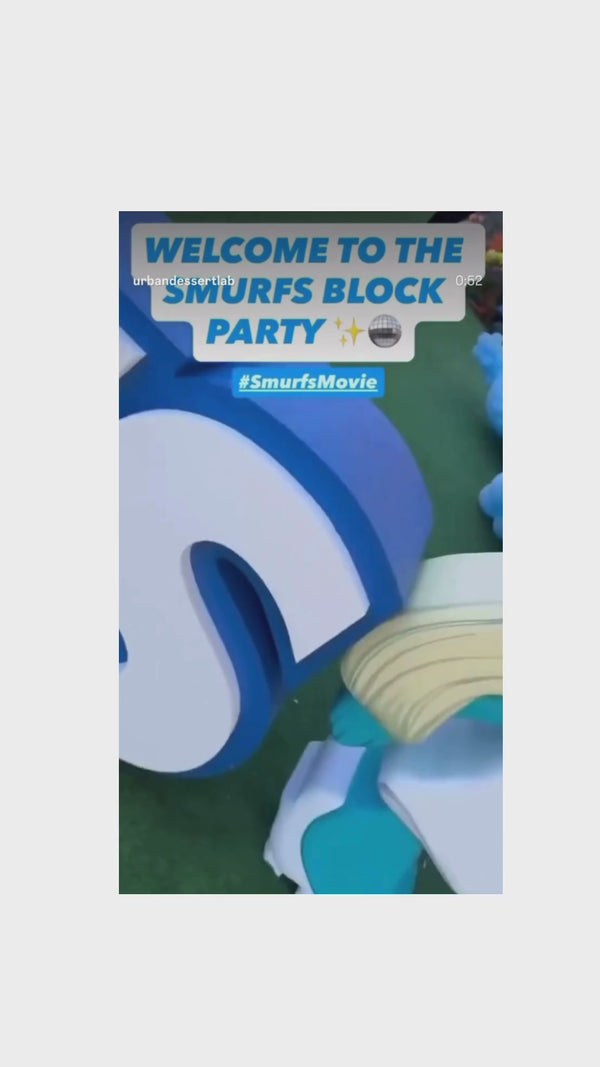 A video showcasing custom desserts by Urban Dessert Lab for Smurf movie release at movie studio.